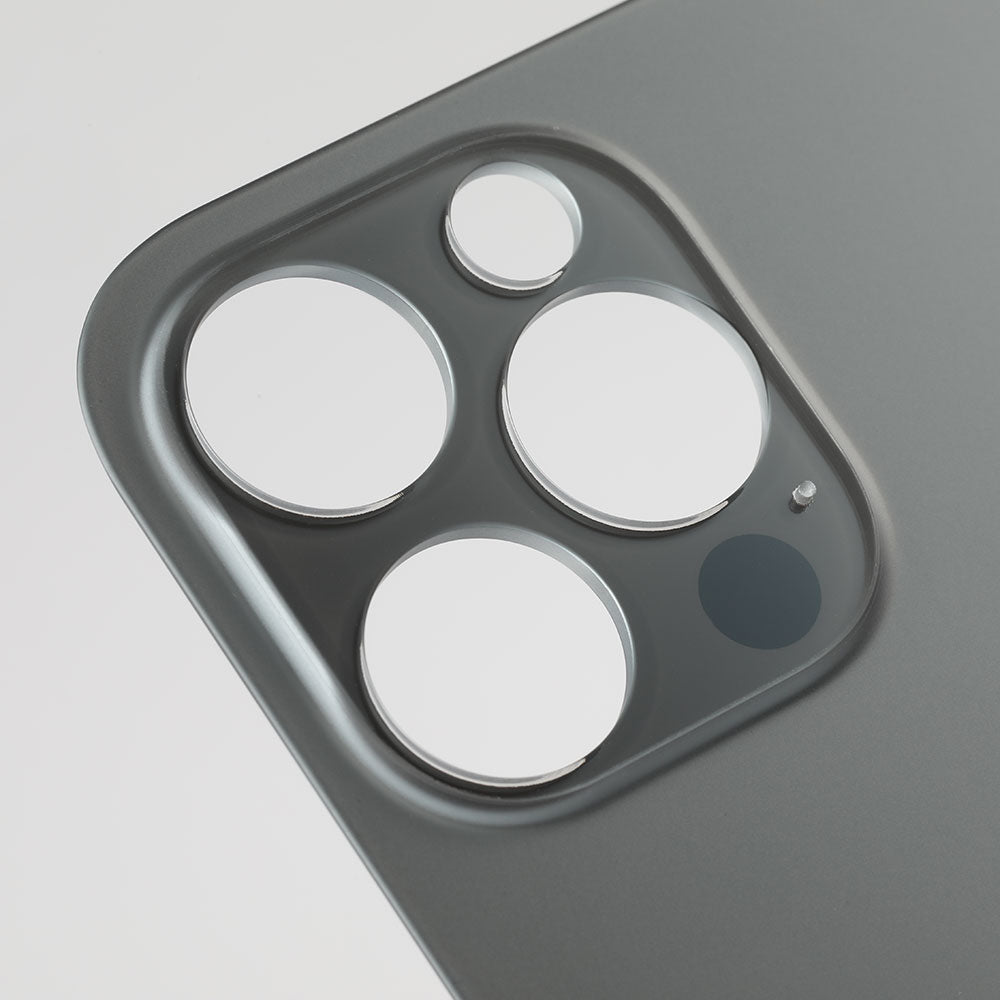 Close-up of the Cirrus-link Back Glass Cover with Big Camera slot for iPhone 12 PRO (AfterMarket), featuring three large and two small cutouts in a metal casing for the rear camera module.