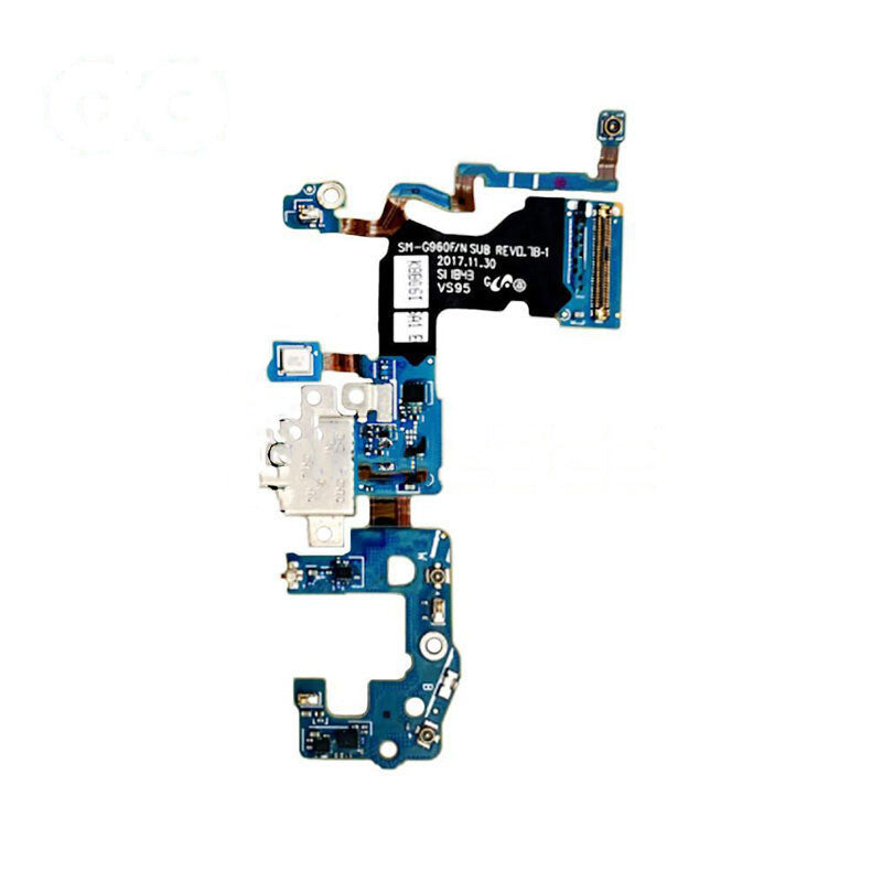 A close-up view of a blue mobile phone circuit board, labeled SM-G960F, featuring various electronic components and connectors on a white background. This Charging Port Board for Samsung Galaxy S9 (G960F) from OG, sourced with OEM Pulled quality, is the perfect replacement for your broken board.