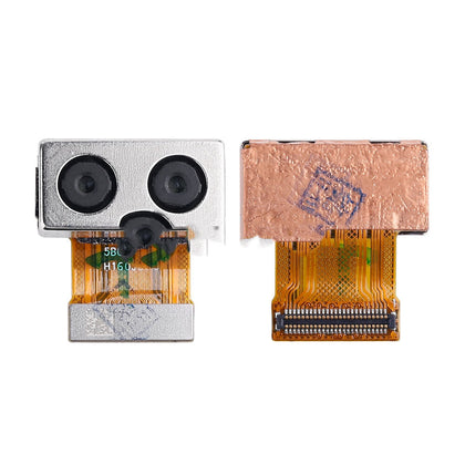 Close-up of an OG Rear Camera Replacement for Huawei Ascend P9 Plus and flex cable, viewed from the front and back. The front shows two lenses, while the back reveals gold contacts and a stamped copper surface—ideal for a replacement camera.