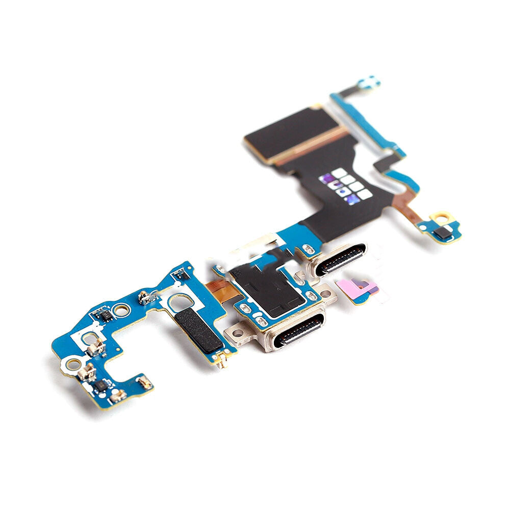 Close-up image of a Samsung Galaxy S9 circuit board featuring multiple connectors and components, including the OG Charging Port Flex Cable For Samsung Galaxy S9 (G960U), against a white background.