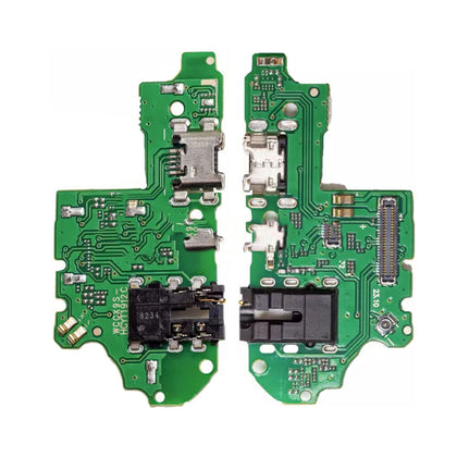 A close-up view of a green, dual-sided circuit board with electronic components and connectors, likely from a Huawei P Smart (2020), showcases precision engineering. This Charging Port Board For Huawei P Smart (2020) (Standard), resembling quality expected from Dr.Parts, is intricate and reliable for optimal performance.