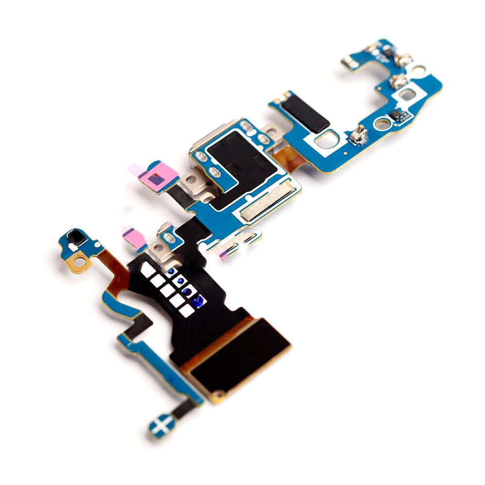 A close-up view of the internal circuit board component of a smartphone, showcasing small electronic parts, connectors, and intricate pathways, highlights the OEM quality of the OG Charging Port Flex Cable Replacement for the Samsung Galaxy S9 (G960U).