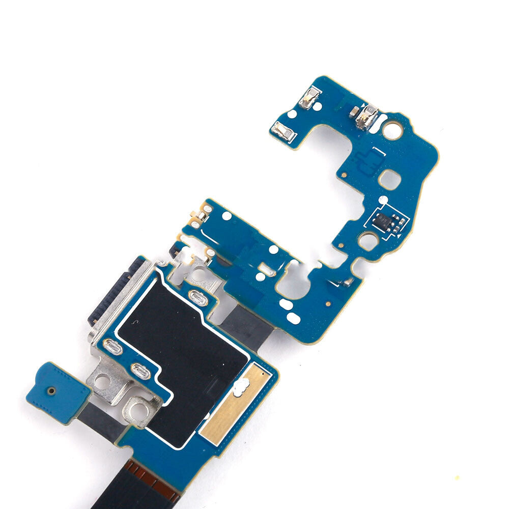 Close-up of a blue circuit board with various components, including connectors and soldered joints, showcasing OEM quality similar to the OG Charging Port Board for Samsung Galaxy S9 G960F, on a white background.