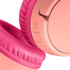 Close-up of BELKIN SoundForm Mini Wireless - On-Ear Headphones for Kids in Pink, focusing on the volume control buttons with volume limitation.