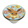A decorative pin featuring an illustration of Eevee, a Pokemon, surrounded by colorful flowers on a blue background, compatible with swappable PopSockets PopGrip Licensed - Floral Eevee for easy wireless charging.