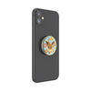 Black smartphone with a camera and a POPSOCKETS PopGrip Licensed - Floral Eevee, designed for wireless charging with swappable PopTops.