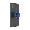 Black smartphone with a blue POPSOCKETS PopGrip Licensed - Enamel Mandalorian attached to the back, featuring swap PopTops for customizable style and wireless charging compatibility.