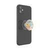 Black smartphone with a POPSOCKETS PopGrip Licensed - Pokemon Multi attached to its back, facilitating swappable PopTops.