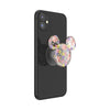 A black smartphone with a POPSOCKETS PopGrip Licensed (Gen2) - Disney Translucent Mickey Mouse Cascading Flowers on the back, featuring swappable PopTops for customization.