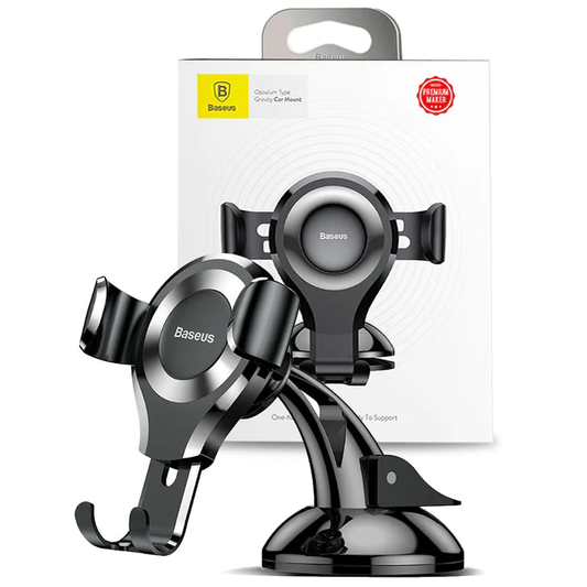 The BASEUS Gravity Universal Car Phone Holder with Adhesive Mount for dashboard and windshield is shown in front of its box, providing secure, hands-free navigation for your drive.