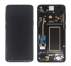 A Cirrus-link Screen Samsung S9 Service Pack – Purple with the screen turned off is placed next to the phone’s open back panel, revealing its internal components and the replacement screen from a Service Pack.