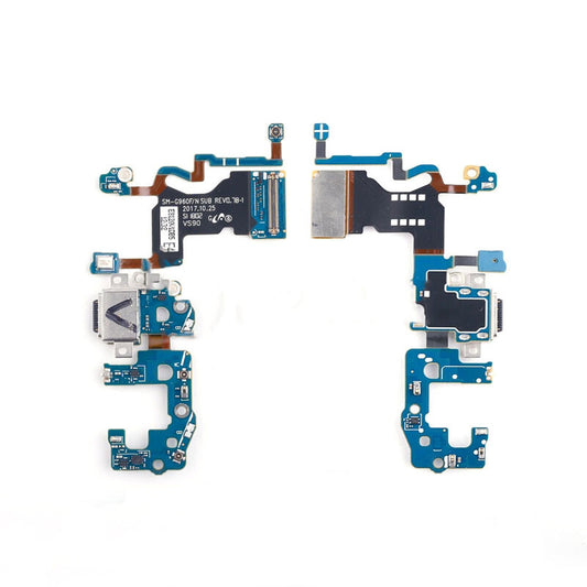 A disassembled smartphone motherboard for the Samsung Galaxy S9, showcasing various electronic components and circuit pathways, including an OG brand Charging Port Board For Samsung Galaxy S9 G960F, on a white background.