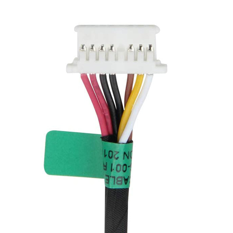 A white and green Cirrus-link cable with wires attached to it.